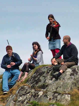 Photo of musicians playing at the Pipers Picnic at Gigha Music Festival