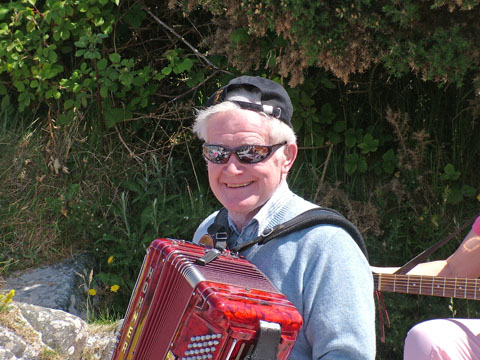 Photo of Graham our oldest musician, resident box player and star of many a session